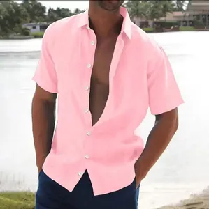 Detail shot of a pink men's casual beach shirt featuring a linen-like texture and buttons