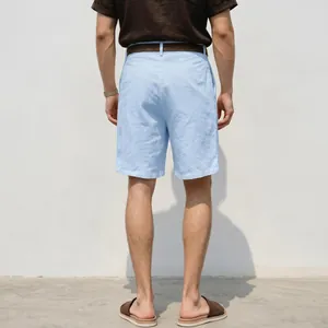 Back view of men's breathable light blue linen shorts for a casual summer look