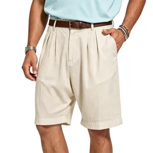 Close-up detail of men's pleated beige linen shorts with breathable fabric for summer style