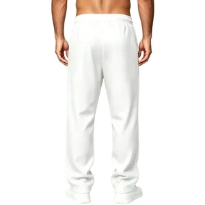 Close-up macro view of the waffle-textured fabric on white casual men's lounge pants