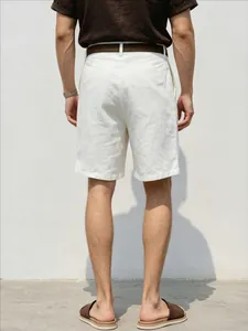 Rear view of man wearing white breathable linen cotton casual shorts for summer vacation