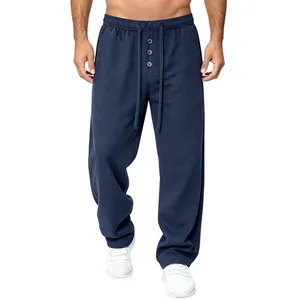 Men's navy waffle-knit loose casual pants with drawstring waist and straight leg fit