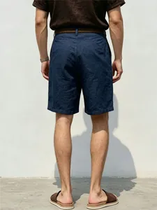 Back view of men's relaxed fit navy linen shorts for a casual vacation look