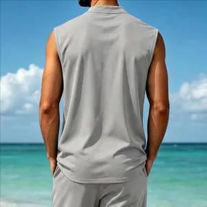 Detail view showing the back of a men's quick-dry gray sleeveless vest at the beach