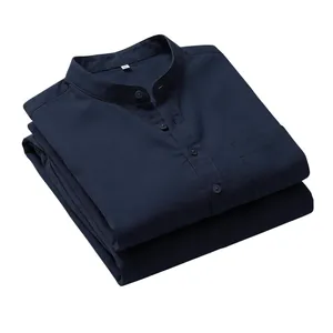 Close-up of folded navy blue Henley shirt showing button detail and fabric texture