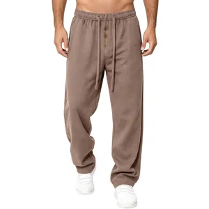 Front view of men's waffle knit lounge pants with drawstring waist and buttons