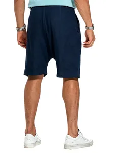 Back view of navy blue men's linen shorts showing relaxed fit and natural texture