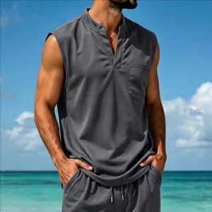 Detail of men's gray quick-dry V-neck sleeveless top with chest pocket on beach
