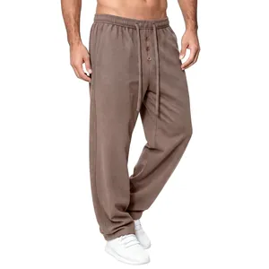 Detail view of men's brown waffle textured straight leg casual pants with drawstring