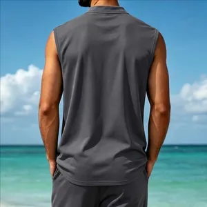 Back view of a breathable gray quick-dry sleeveless vest for men against a beach backdrop.