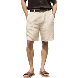 Men's loose beige linen shorts featuring a relaxed straight-leg fit for casual summer wear