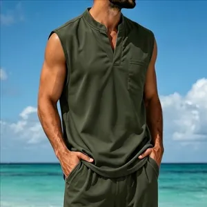 Macro detail of olive green men's quick-dry V-neck sleeveless top in a beach setting