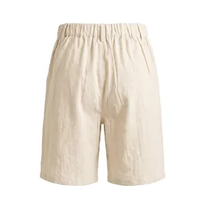 Back detail of men's breathable cream linen shorts featuring an elasticated waistband