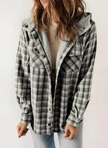 Detailed view of women's oversized plaid hooded jacket with warm grey fleece lining