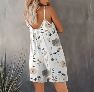 Close-up detail of the back view of a casual white floral print romper with V-neck.