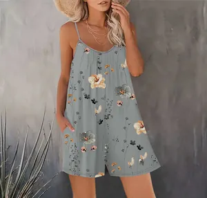 Detail view of casual grey floral romper with functional side pockets and V-neck.