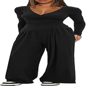 Detail view of women's black two-piece lounge set with V-neck long sleeve top and wide leg pants