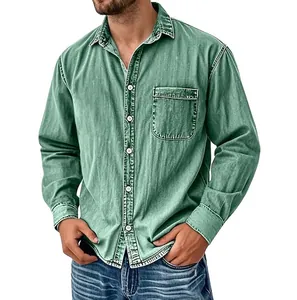 Close-up detail of men's washed green denim shirt in classic American workwear style.