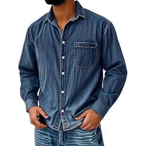 Close-up of a vintage washed blue denim long-sleeved shirt with a chest pocket