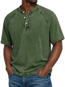 Macro detail of men's vintage washed olive green cotton Henley shirt showing texture and buttons