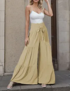 Pantaloni plissettati a gamba larga a vita alta con cintura a fiocco e design a balze