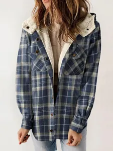 Close-up of women's blue plaid hooded jacket with warm faux shearling lining