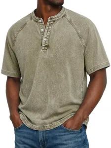 Detail of vintage washed olive green cotton Henley shirt with raglan sleeves