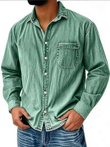 Men's green washed denim shirt with long sleeves and chest pocket workwear