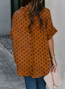 Back view of brown polka dot Polo shirt with five-point sleeves and button details.