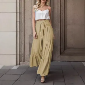 Eleganti pantaloni a gamba larga pieghettati a vita alta con cintura a fiocco