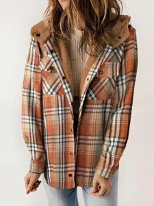 Women's plaid hooded fleece-lined jacket with cozy faux fur trim and oversized fit.