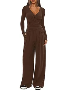 Elegant brown two-piece lounge set with V-neck long sleeve top and wide-leg pants.