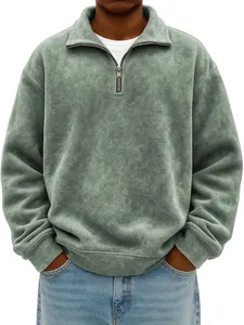 Detail of men's half-zip distressed sweatshirt in sage green with polo collar