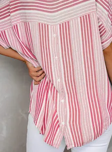 Close-up of pink and white striped shirt featuring a stylish button-down back detail