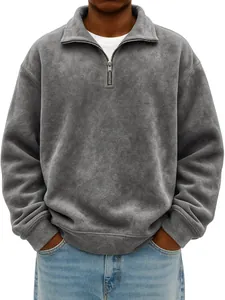 Close-up of men's grey distressed half-zip sweatshirt with relaxed collar fit