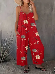 Full view of women's red floral print sleeveless jumpsuit with pockets and wide legs
