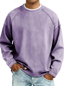 Detail shot of vintage washed purple crewneck sweatshirt on model, loose casual fit
