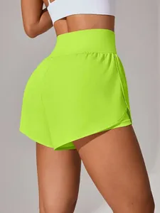 Pantaloncini sportivi a doppio strato verde neon ad asciugatura rapida a vita alta donna