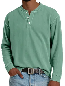 Detailed view of men's green long-sleeved ribbed Henley shirt with three white buttons
