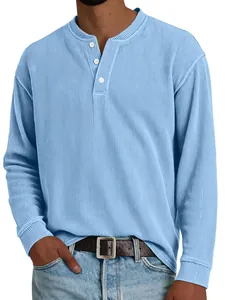 Detail view of a light blue ribbed Henley shirt for men with three white buttons