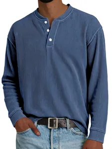 Detail shot of men's blue ribbed Henley long sleeve shirt showing fabric texture
