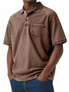 Men's vintage washed brown polo shirt with chest pocket and button-down collar detail.