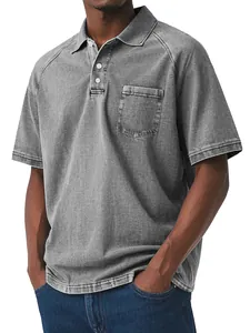 Detailed view of men's vintage wash gray polo shirt with front pocket and button collar
