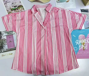 A detailed view of the pink and white vertical striped V-neck short sleeve shirt