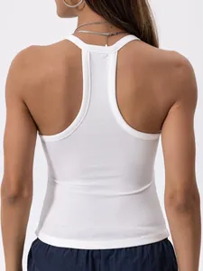 Detail view showing the racerback design of a women's white ribbed sports tank top