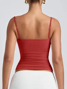 Back view detail of women's red camisole with adjustable spaghetti straps and metal buckles