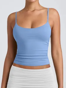 Detailed view of women's blue scoop neck camisole showing slim fit and gathered waist.