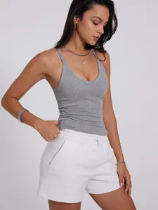 Detailed macro view showing the gray ribbed fabric texture of a V-neck sports tank top