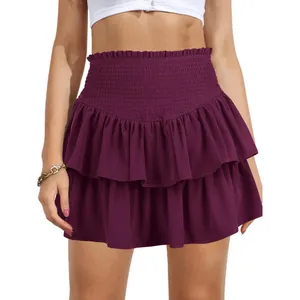 Close-up of a purple high-waisted ruffled mini skirt with smocked waistband