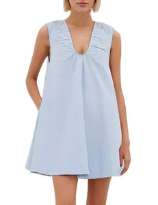 Detailed view of a light blue sleeveless mini dress featuring a pleated deep V-neck